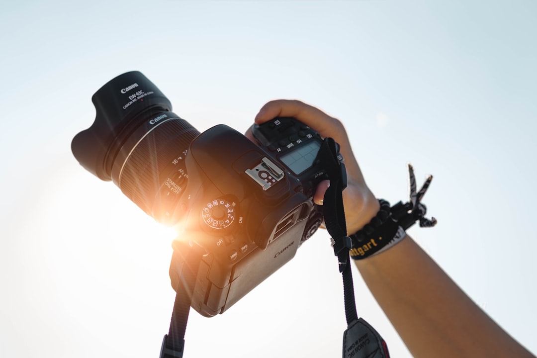 a-person-holding-a-camera-up-to-take-a-picture-gvbof8mde3u
